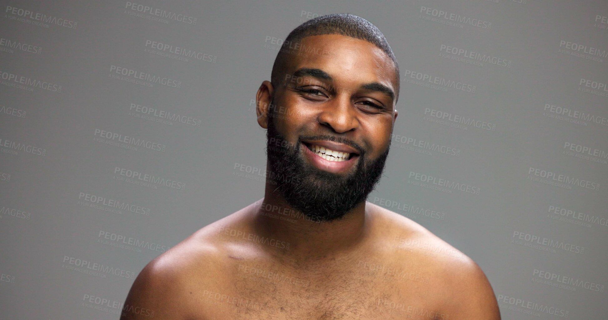 Buy stock photo Portrait, cosmetics and black man in studio, smile and dermatology on gray background. African person, mockup space and happy model with skincare, grooming and shine with glow, confidence or wellness