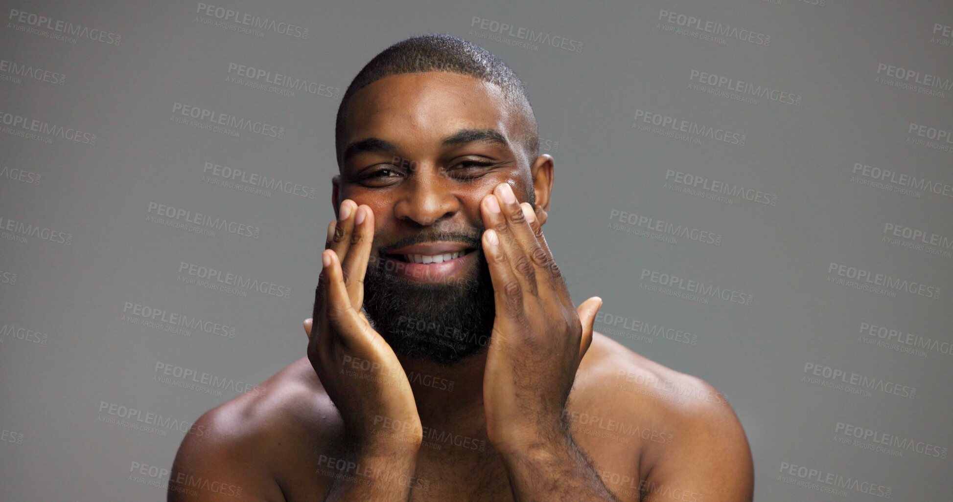 Buy stock photo Smile, skincare and portrait of black man in studio for beauty, grooming and dermatology. Cosmetics, facial glow and self care with male person on gray background for hydration, hygiene and shine