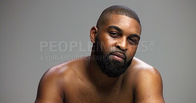 Buy stock photo Beauty, skincare and portrait of black man in studio for salon, grooming and dermatology. Cosmetics, glow and self care with person and facial on gray background for hydration, hygiene and shine