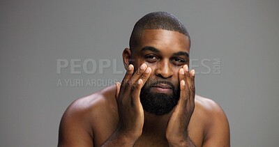 Buy stock photo Cream, skincare and portrait of black man in studio for beauty, grooming and dermatology. Cosmetics, glow and self care with person and lotion on gray background for hydration, hygiene and shine