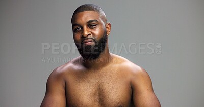 Buy stock photo Portrait, skincare and black man in studio, wellness and cosmetics on gray background. African person, mockup space and model with treatment, grooming and shine with dermatology, glowing and beauty