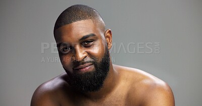 Buy stock photo Portrait, skincare and black man in studio, dermatology and cosmetics on gray background. African person, mockup space and happy model with self care, grooming and shine with glow, beauty or wellness