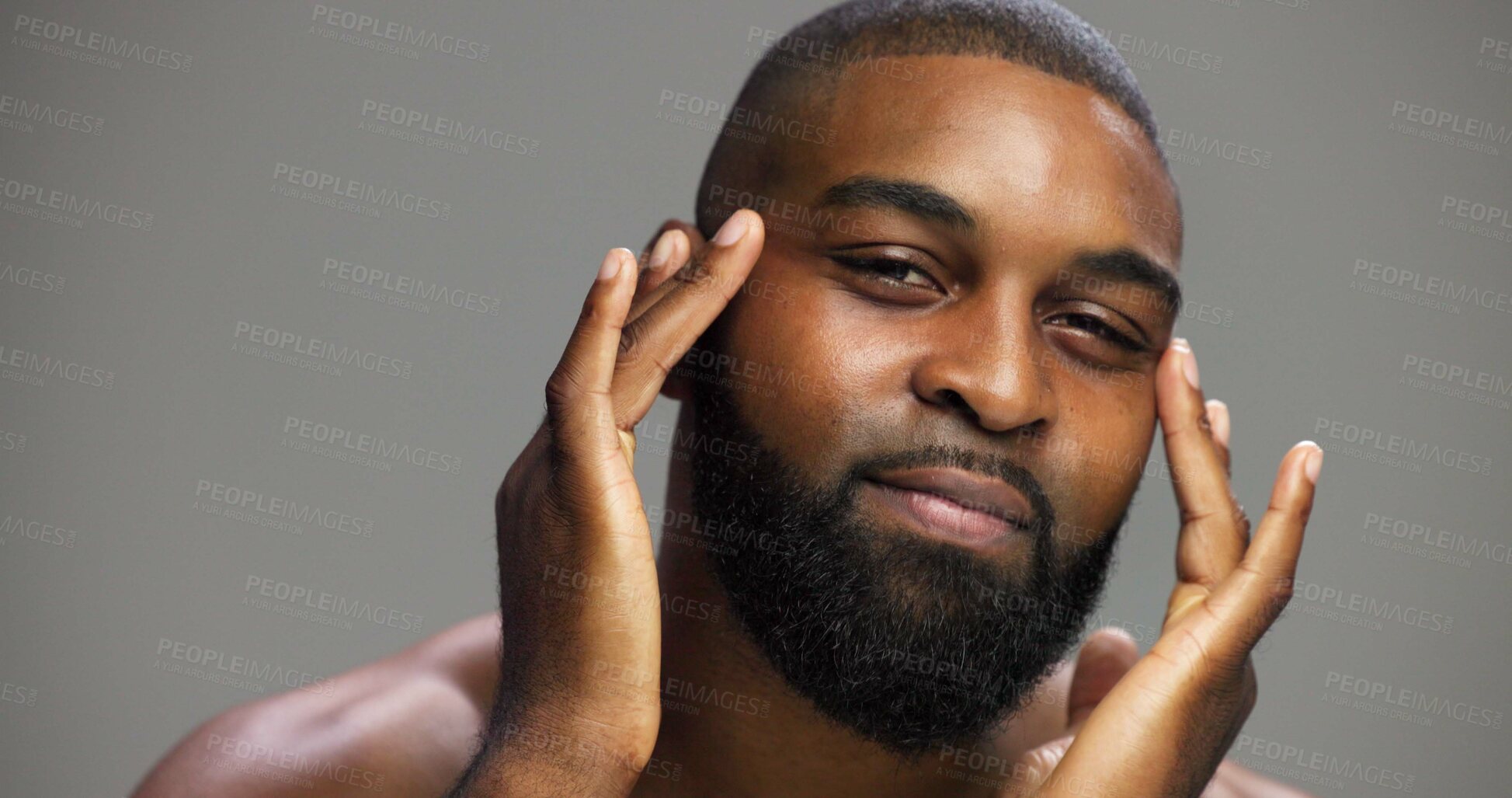 Buy stock photo Facial, skincare and portrait of black man in studio for salon, grooming and dermatology. Cosmetics, glow and self care with person and beauty on gray background for hydration, hygiene and shine