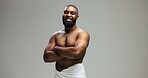 Portrait, skincare and black man in studio, arms crossed and dermatology on grey background. African person, space and happy model with cosmetics, shirtless and muscle with confidence, smile or pride