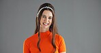 Happy, fashion and portrait of woman in studio with trendy clothes, cool style and retro outfit. Mockup space, accessory and isolated person with confidence, pride and smile on gray background