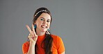 Portrait, smile and woman with peace sign for fashion on gray background mockup space with retro style. Happy, hand gesture and person with v symbol for victory, winning emoji and success in studio