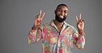 Portrait, peace sign or black man in studio, retro fashion or clothing style on gray background. African person, face or model with hand gesture, v symbol or emoji with vintage outfit or mockup space