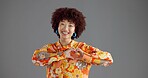 Happy woman, portrait and fashion with heart hands in studio for retro style on a gray background. Face, female person or model with smile, afro or romantic gesture for love in vintage clothing