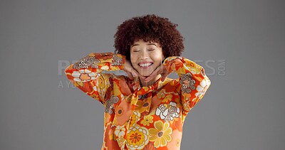 Buy stock photo Girl, happy and retro fashion in studio for aesthetic outfit, vintage style and confident personality. Mockup space, woman and smile with floral shirt on gray background for pride or colorful clothes