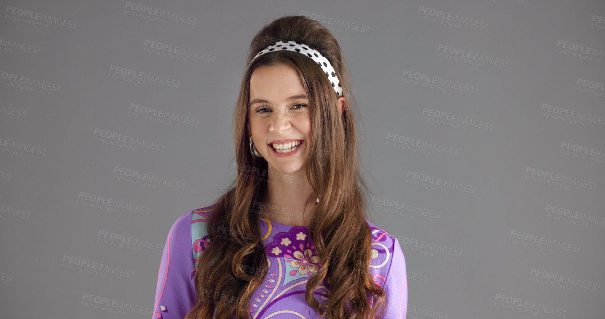Buy stock photo Woman, vintage fashion and portrait in studio with smile, confidence or retro outfit for aesthetic. Pin up girl, designer or happy on gray background space with paisley style, floral print and hairdo