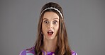 Woman, portrait and surprise in studio for gossip, rumor or retro fashion on a gray background. Face, female person or model with gasp or wow in vintage clothing for shocking news on mockup space