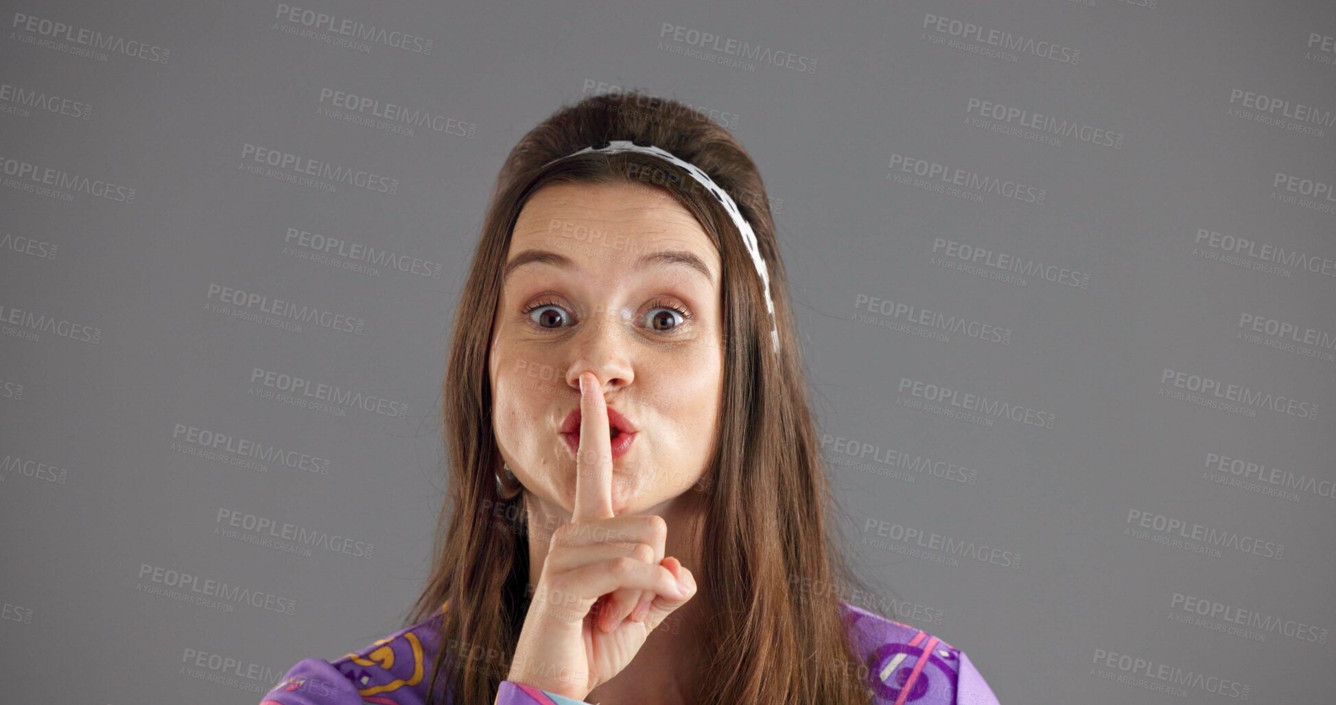 Buy stock photo Quiet, secret and portrait of woman in studio for gossip, silence and privacy on gray background. Emoji, gesture and face of person with finger for confidential news and shh, whisper and mystery
