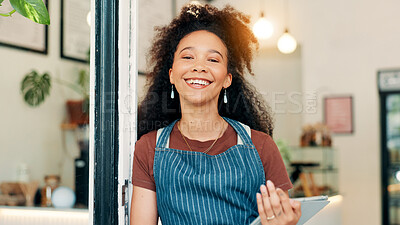 Buy stock photo Barista, woman or tablet in door of cafe for customer welcome, seating plan or hospitality. Server, portrait or happy with digital app in restaurant doorway for online management or ready for service