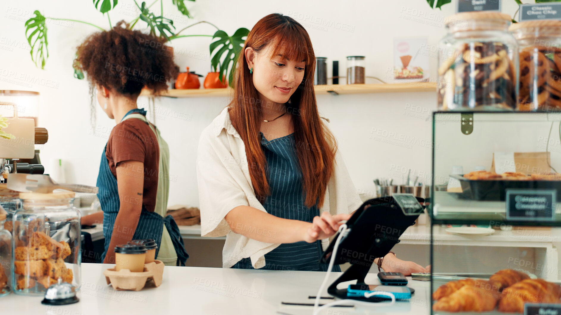 Buy stock photo Waitress, woman and cash register in cafe for POS, track inventory or process payment at counter. Small business, cashier and electronic system for customer service, record transaction or hospitality