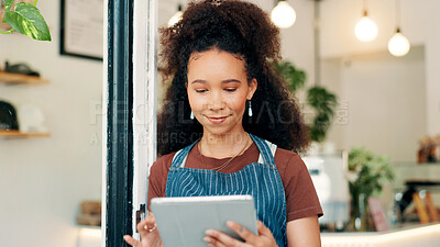 Buy stock photo Barista, tablet and reading with woman in cafe for research, digital inventory or restaurant supply checklist. Waitress, catering review and small business owner with person in coffee shop for menu