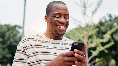 Buy stock photo Park, black man and hands with smartphone for social media, online communication and comment for reel. Outdoor, male person and laughing with mobile for application, funny joke and chat with contact