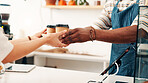 Cafe, coffee and hands of person with customer at counter for serving drinks, latte and cappuccino. Restaurant, hospitality and waiter with takeaway cups for service, store products and pos help