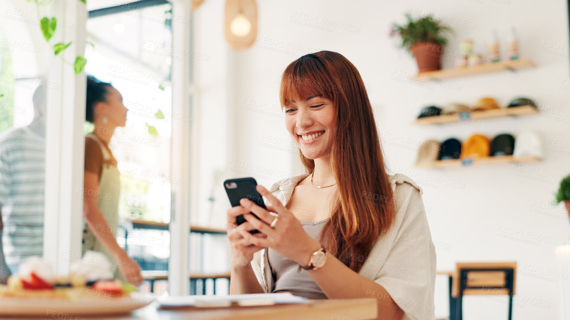 Buy stock photo Cafe, woman and smile with smartphone for social media, online communication and comment for reel. Restaurant, female person and customer with mobile for application, funny joke and chat with contact