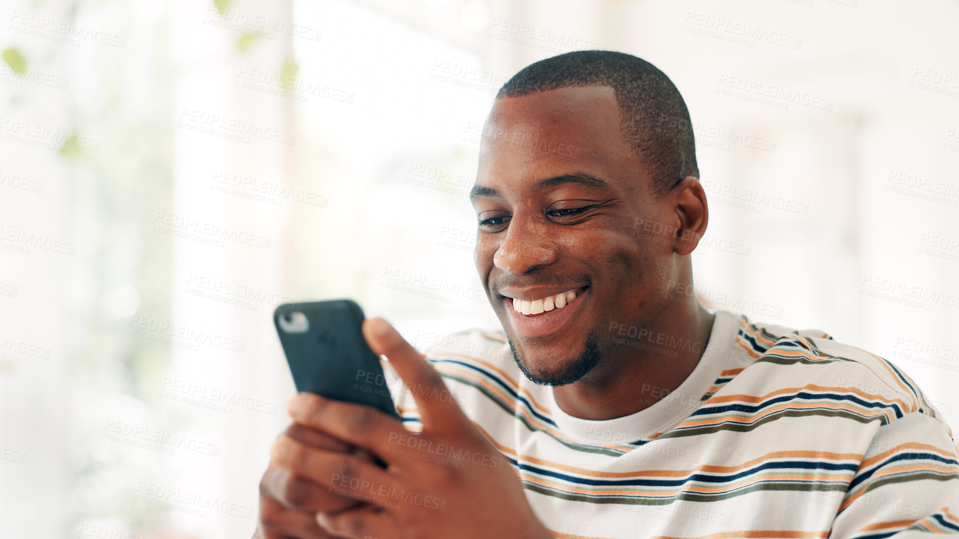 Buy stock photo Cafe, black man and smile with smartphone for social media, online communication and comment for reel. Restaurant, male person and customer with mobile for application, laughing and chat with contact