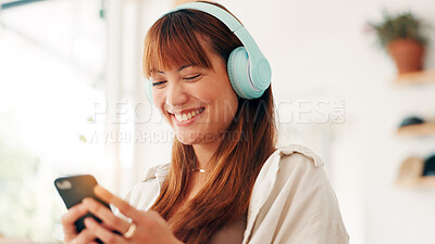 Buy stock photo Headphones, smartphone and woman in cafe, smile and listening to music, audio and search website. Happy person, customer and mobile user with cellphone, sound and radio with podcast in coffee shop
