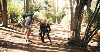 Buy stock photo Senior, couple and hiking with help for knee pain, injury or accident with support or wellness check. Travel, concern and man with woman for trekking fall, care or aid with sprain outdoor in forest
