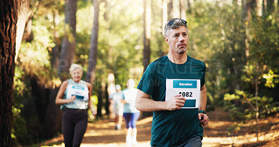 Buy stock photo Competition, marathon and race with man in forest for challenge, performance or run. Action, cardio and exercise with mature runner at rally event in nature or woods for course, heat or trial