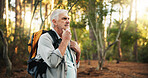 Hiking, senior man and thinking outdoor with walking direction, retirement hobby and cardio wellness. Trekking, mature person and backpack in forest for sightseeing, nature journey or exploring woods