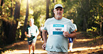 Cardio, marathon and running with man in forest for challenge, performance or race. Action, competition and fitness with mature runner at rally event in nature or woods for course, heat or trial
