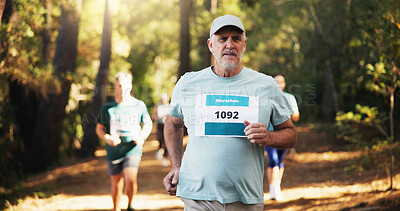 Buy stock photo Cardio, marathon and running with man in forest for challenge, performance or race. Action, competition and fitness with mature runner at rally event in nature or woods for course, heat or trial