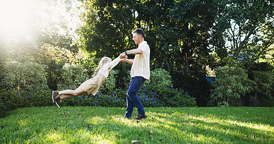 Buy stock photo Garden, playing or spinning with dad and daughter outdoor in summer for bonding or having fun. Game, swinging or turning with single parent man and girl child in backyard for vacation as family