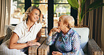 Lounge, senior mother and woman with communication for bonding together, funny memory and connection. Home, elderly mom and adult daughter with relationship for conversation, catch up and support