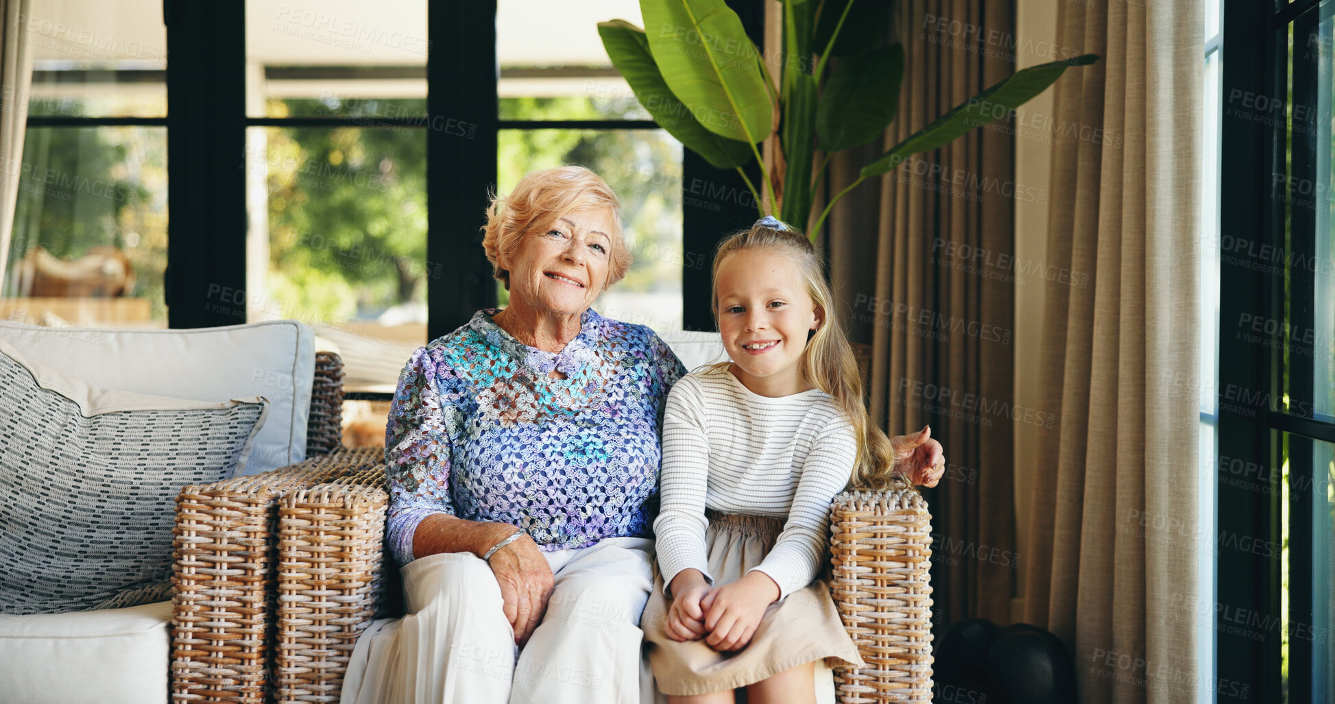 Buy stock photo Portrait, home and grandmother with girl, smile and bonding together with generations, trust and love. Face, senior woman and child with happiness, joy and family with care, support and weekend break