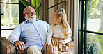 Family, grandpa and bonding with grandchild, house and conversation with senior man in living room. Home, elderly person and talking to granddaughter in lounge, relax and happy grandfather with kid