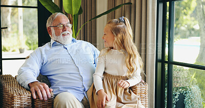Buy stock photo Family, grandpa and bonding with grandchild, house and conversation with senior man in living room. Home, elderly person and talking to granddaughter in lounge, relax and happy grandfather with kid