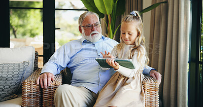 Buy stock photo Relax, grandfather and child with tablet on sofa for playing online game, watching cartoon and weekend visit. Love, old man and girl with digital app in home for streaming service or bonding together