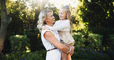 Buy stock photo Outdoor, smile and mother with child for carrying, relationship and connection together in park. Happy family, mom and girl with love for bonding, caring and trust on weekend holiday in nature