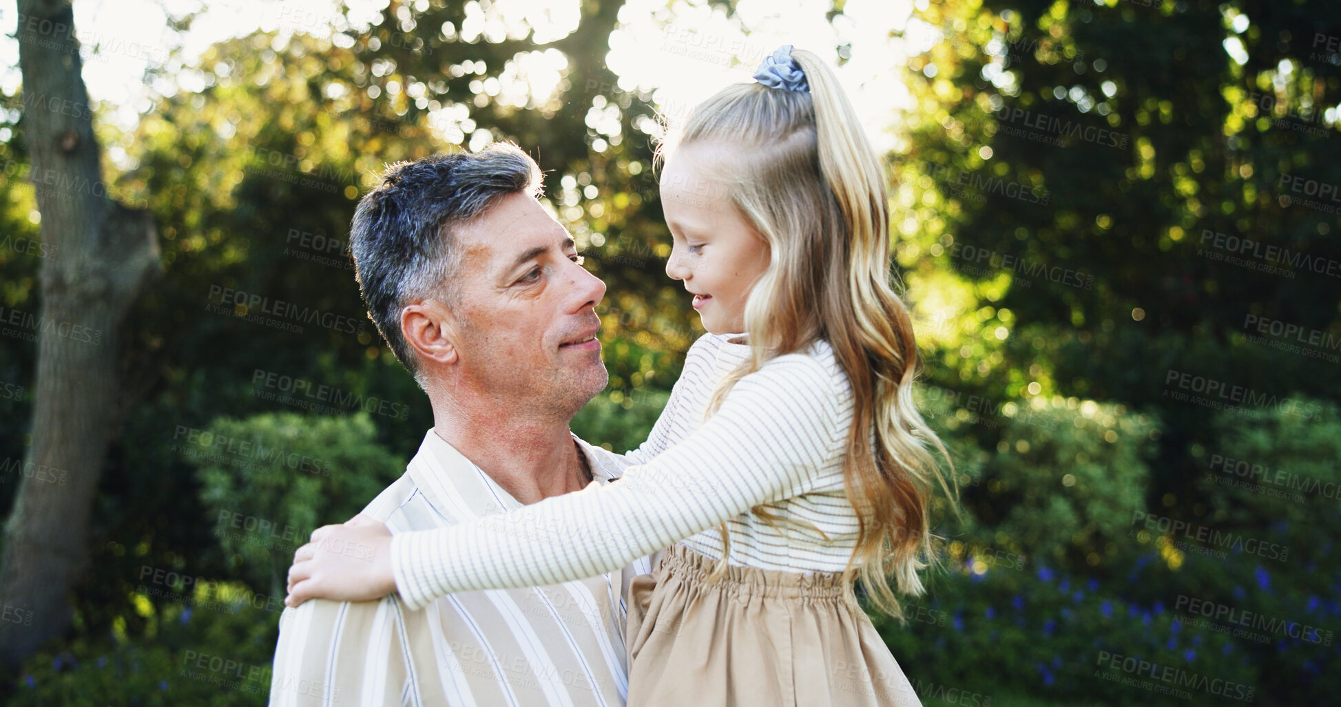 Buy stock photo Outdoor, smile and father with child for carrying, relationship and connection together in park. Family, mature dad and happy girl with love for bonding, caring and trust on weekend holiday in nature