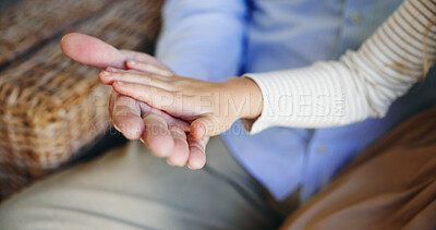 Buy stock photo Holding hands, grandparent and grandchild in home, closeup or bonding with kid in living room or comfort. Affection, support and family with love in lounge, compassion or care elderly person in house