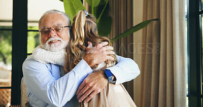 Buy stock photo Home, hug and grandpa with child, welcome and happy for visit, bonding and senior man with granddaughter. Family, elderly person and embrace with girl in house, care and smile with kid in living room