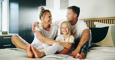 Buy stock photo Happy, parents and hug child in bedroom for love, security and bonding together for weekend break. Smile, family and embrace with girl for support, affection and care for childhood growth at house