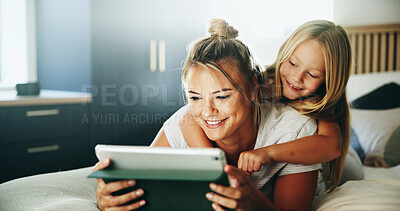 Buy stock photo Happy mom, daughter and relax with tablet on bed for online entertainment, show or cartoon at home. Mother, child or kid lying with smile on technology for subscription, app or streaming in bedroom