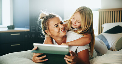 Buy stock photo Happy mom, kid and relax with tablet on bed for online entertainment, show or cartoon at home. Mother, child or daughter lying with smile on technology for subscription, app or streaming in bedroom