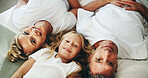 Portrait, parents and child relax on bed with love, security and bonding together in bedroom. Above, smile and people rest with kid for support, care and family relationship of weekend break at house