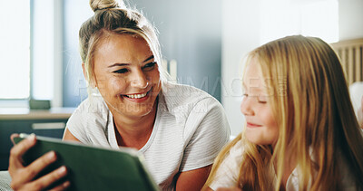 Buy stock photo Happy mom, kid and watching with tablet on bed for online entertainment, show or cartoon at home. Mother, child or daughter lying with smile on technology for subscription, app or streaming at house