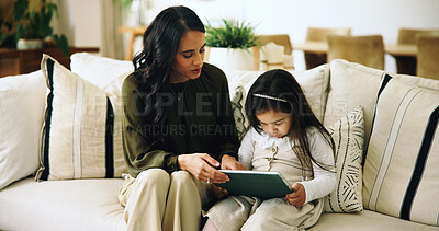 Buy stock photo Home, mother or girl with tablet, internet or bonding together with help, ebook or digital app for language. Screen time, mama or daughter in lounge, tech or online safety with education and learning