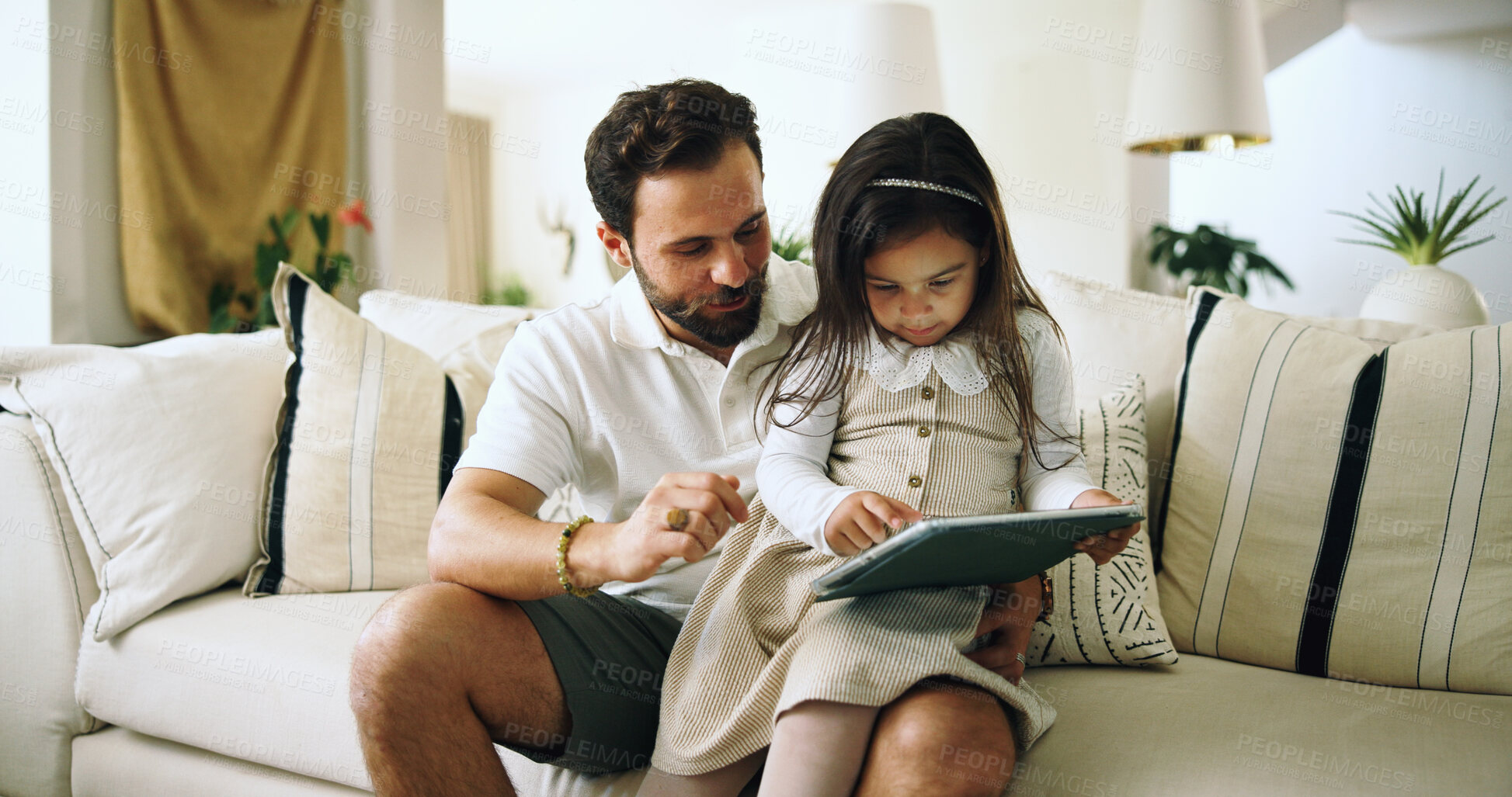 Buy stock photo Home, father and girl with tablet, internet and bonding together with cartoon, ebook or digital app for game. Help, dad or daughter in lounge, tech or online safety with entertainment or animation