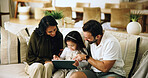 Home, parents and girl with tablet, help and bonding together with happiness, love and digital app for game. Mother, father or daughter in lounge, tech or online safety with entertainment and cartoon