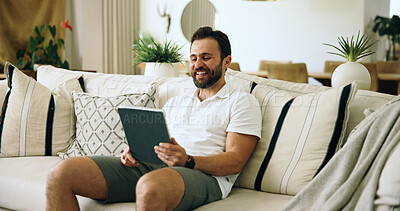 Buy stock photo Home, smile and man on sofa, tablet and internet with online video for humor, joke and comedy. Apartment, tech and happy person on couch, social media and laughing with digital app for entertainment