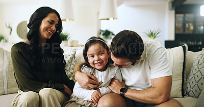 Buy stock photo Hug, happy family and parents with girl, living room and sofa with love, bonding and relax in home. Mom, dad and child on couch with support, man and woman with daughter for weekend break or trust
