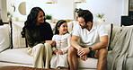 Smile, happy family and parents with girl, living room and sofa with love, bonding and relax in home. Mom, dad and child on couch with support, man and woman with daughter for weekend break or trust